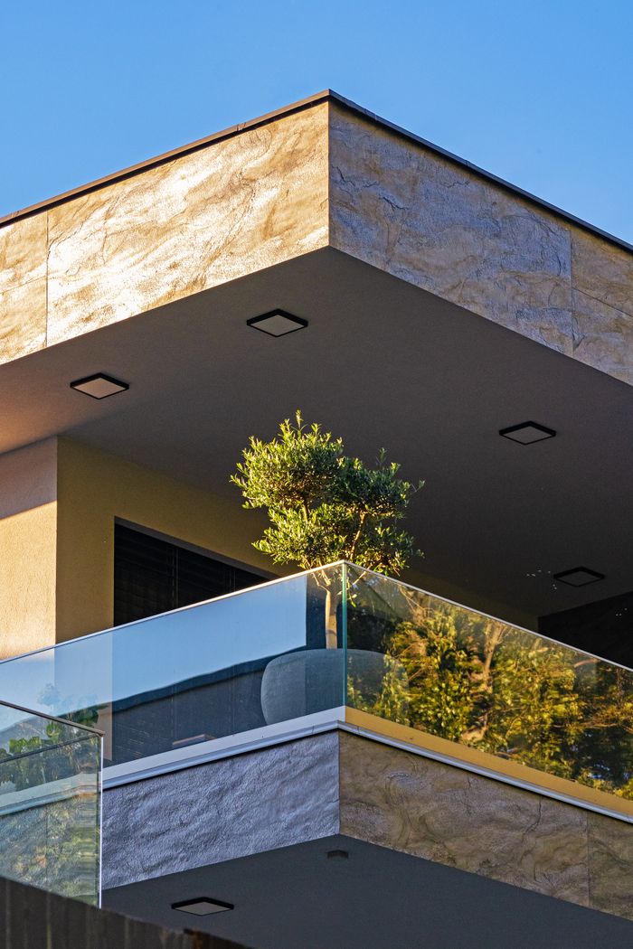 Services Stunning modern balcony design with glass railings in Budapest, Hungary.